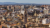 Spain, Valencia, Old town buildings rooftops and church tower