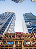 Australia, New South Wales, Sydney, Low angle view of hotel between skyscrapers