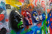Close-up of artwork faces at John Lennon Wall, Prague, Bohemia, Czech Republic (Czechia), Europe