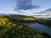 Aerial view of Caldeira Funda lake in Flores Island at sunset, Azores islands, Portugal, Atlantic, Europe