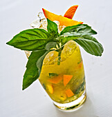 Mojito with oranges and basil