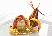 Lobster tail with wasabi sauce, chickpeas and parmesan ring