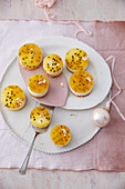 Passion fruit tart with coconut rusk base