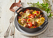 Meatballs au gratin with potatoes and cheese