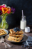 Belgian waffles served with blueberries
