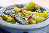 Pickled cucumbers in vinegar brine with mustard seeds