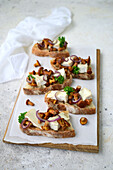 Sandwiches with chanterelles, camembert, and onion confit