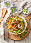 Cous cous salad with veal meatballs