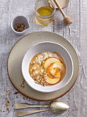 Breakfast oatmeal with honey and apples