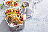 Puff pastry parcels with ham and cheese
