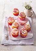 Yogurt cupcakes with fruit syrup