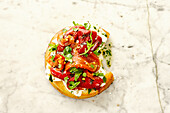Mini focaccia with pointed peppers, buffalo mozzarella, cilantro, and rocket salad