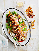 Poached duck and cashew salad with duck crackling