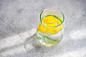 Glass of water with organic lemon slice