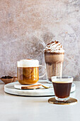 Espresso, latte with foam and coffee milkshake
