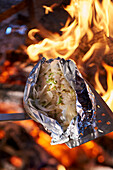 Barracuda cooked in foil over the grill