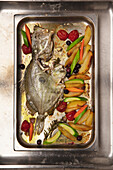 St Peter's fish with colorful oven vegetables (Marche)