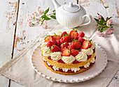 Strawberry cake with sponge cake and cream