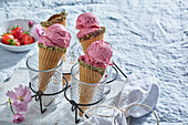 Lactose-free strawberry ice cream cones