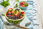 Summer fruit salad in watermelon bowl