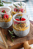 Chia dessert with passion fruit and raspberries