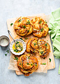 Pesto yeast knots with garlic butter