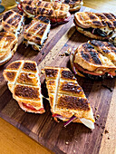 Braaibroodjie (Grilled sandwich with cheese, onions and tomatoes, South Africa)