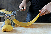 Rolling out dough with the pasta machine