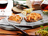 Pork neck steaks gratinated with cheese