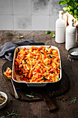 Pasta bake with tomato sauce, courgette, red pepper and carrots