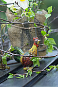 Birch twigs and rooster figure, Easter decoration