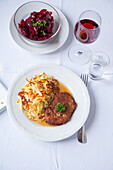 Veal escalope with hash browns and beetroot salsa