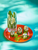 Virgin Mojito (non-alcoholic) and cucumber bites with cream cheese and mackerel