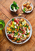 Simple Italian bread salad with tomatoes and peaches