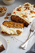 Carrot pound cake with wallnuts and cheese frosting