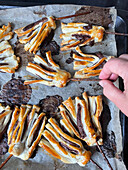 Chocolate brooms made from puff pastry for Halloween