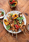 Grilled marinated chicken skewers with peppers