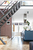 Modern loft kitchen with blue kitchen island