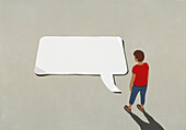 Man looking down at large blank communication speech bubble\n
