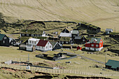 Houses in sunny village, Mykines, Faroe Islands\n