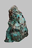 Close up textured German chrysocolla stone on gray background\n
