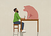 Man with fork and knife staring at pig on dining table\n