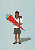 Portrait Schulmädchen mit großer Zipfelmütze