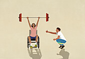 Supportive boyfriend cheering strong girlfriend in wheelchair weightlifting barbell overhead\n