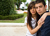 Portrait of young couple posing\n