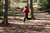 Portrait of a man running in the park\n