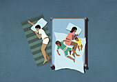 Father sleeping on floor next to wife and children in bed\n