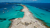 Aerial of the white sand beach of Platja de Ses Illetes, Formentera, Balearic Islands, Spain, Mediterranean, Europe\n