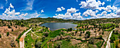 Aerial of the artificial lake near Zahoura, Northern Cameroon, Africa\n