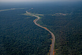 Empty highway in the jungle, future capital Ciudad de la Paz, Rio Muni, Equatorial Guinea, Africa\n